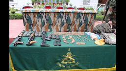 Arms and ammunition recovered from terrorists by the Army during an anti-infiltration operation along the Line of Control (LoC) in J&K's Uri sector. Force killed three terrorists during the operation. (PTI)