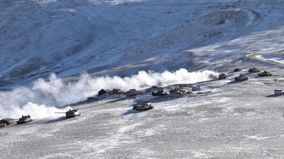 Tanks pull back from Pangong Tso region in Ladakh in Feb 2021 after a disengagement agreement between India and China . (AP File) Tanks pull back from Pangong Tso region in Ladakh in Feb 2021 after a disengagement agreement between India and China . (AP File)