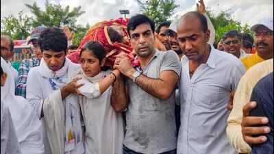 Yashodhra, the daughter of Haryana BJP leader Sonali Phogat, along with others carries the mortal remains of her mother during the funeral procession at Rishi Nagar in Hisar on Friday. (PTI Photo) Yashodhra, the daughter of Haryana BJP leader Sonali Phogat, along with others carries the mortal remains of her mother during the funeral procession at Rishi Nagar in Hisar on Friday. (PTI Photo)