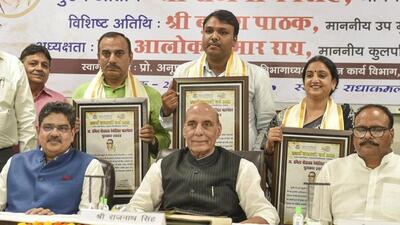 Defence minister Rajnath Singh with Lucknow University vice chancellor Alok Kumar Rai and deputy chief minister Brajesh Pathak in Lucknow on Friday. (PTI PHOTO)