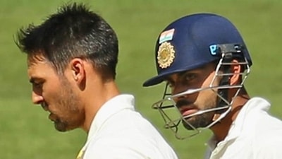 File photo of Mitchell Johnson (L) and Virat Kohli (Getty Images) File photo of Mitchell Johnson (L) and Virat Kohli (Getty Images)