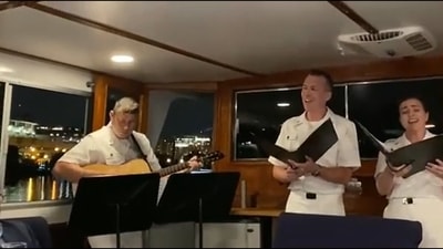 US Navy officers sing Kal Ho Naa Ho on a boat. US Navy officers sing Kal Ho Naa Ho on a boat. 