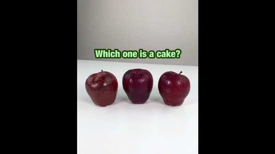 The image, taken from the viral Instagram video, shows three apples. One of the fruits is not real and is a cake.(Instagram/@sideserfcakes)