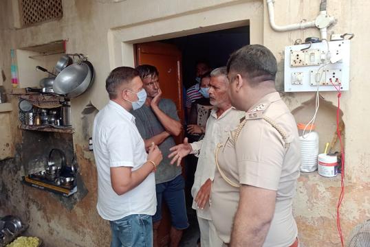 Police questioning a neighbour of the family at Balana village in Ambala district on Friday. (HT Photo) Police questioning a neighbour of the family at Balana village in Ambala district on Friday. (HT Photo)