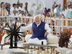 Prime Minister Narendra Modi spinning wheel during 'Khadi Utsav' in Ahmedabad on Saturday, August 27.(PTI) Prime Minister Narendra Modi spinning wheel during 'Khadi Utsav' in Ahmedabad on Saturday, August 27.(PTI)