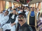 In pictures tweeted by news agency ANI, the legislators of the ruling JMM-Congress-RJD coalition were seen seated in a bus, all smiles, as they flashed victory signs to the camera.(ANI)