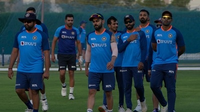 India's captain Rohit Sharma, left, and teammates arrive to participate in a training session (AP) India's captain Rohit Sharma, left, and teammates arrive to participate in a training session (AP)