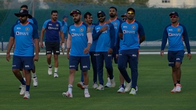 India's captain Rohit Sharma, left, and teammates arrive to participate in a training session (AP) India's captain Rohit Sharma, left, and teammates arrive to participate in a training session (AP)