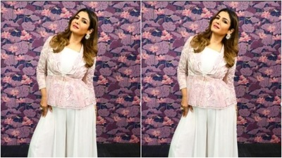 In silver statement ear studs from the house of Masaya Jewellery, Raveena accessorised her look to perfection. (Instagram/@officialraveenatandon)