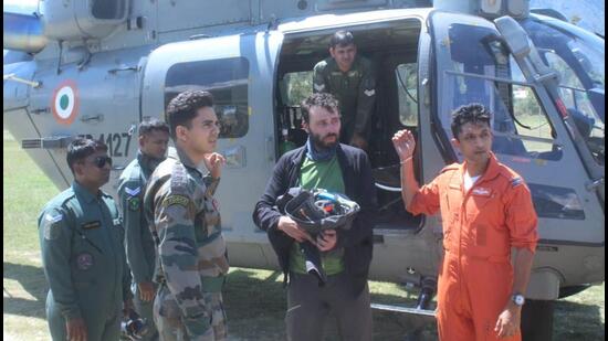 The Hungarian trekker, Akos Vermes, being rescued by the army and the IAF from Jammu and Kashmir’s Kishtwar on Saturday. (HT Photo)
