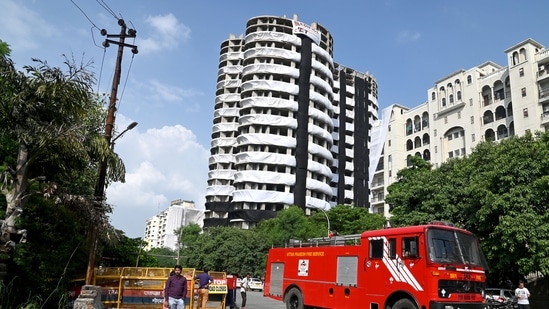 A view of the Supertech's 40 storey illegal Twin Towers Apex &amp; Ceyane all set for demolition, in Noida on Saturday. (ANI Photo)