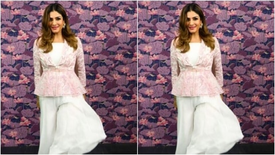 Styled by fashion stylist Richa Ranawat, Raveena wore her coloured tresses open in soft wavy curls with a middle part as she posed for the indoor photoshoot.(Instagram/@officialraveenatandon)