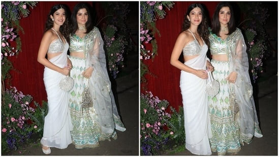 On Friday evening, the paparazzi clicked Shanaya Kapoor and Maheep Kapoor outside the venue of Kunal Rawal and Arpita Mehta's pre-wedding bash. While Shananya chose an ivory saree, Maheep wore a lehenga and choli set adorned with silver and gold sequin work and geometric patterns in green hues. An embroidered zari dupatta, potli bag, choker necklace, and minimal glam picks rounded off the look.(HT Photo/Varinder Chawla)