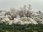 Pulverised concrete dust covers the neighbourhood after demolition of Supertech's twin towers in Noida on Sunday, August 28, 2022. (PTI Photo/Ravi Choudhary) Pulverised concrete dust covers the neighbourhood after demolition of Supertech's twin towers in Noida on Sunday, August 28, 2022. (PTI Photo/Ravi Choudhary)