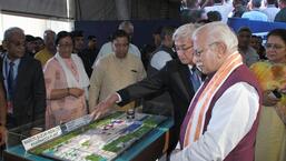 Haryana chief minister Manohar Lal Khattar sees the layout plan of Maruti Suzuki’s plant to be built at Kharkhoda in Sonepat. PM Narendra Modi virtually laid the stone of the plant. (HT Photo)