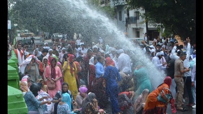 Police using water cannon to disperse protesting JBT teachers in Panchkula on Sunday (Sant Arora/HT)
