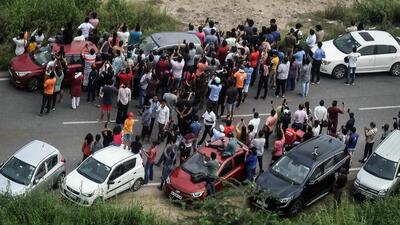 People gather to watch the demolition of the Supertech twin towers in Noida on Sunday. (Raj K Raj/HT Photo) People gather to watch the demolition of the Supertech twin towers in Noida on Sunday. (Raj K Raj/HT Photo)