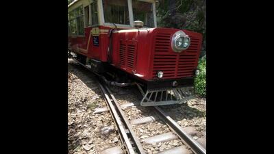 The derailed railcar on Kalka-Shimla heritage track at Shoghi, Shimla, on Sunday. (HT Photo)