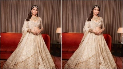 Mrunal further accessorised her look with a statement neck piece, golden earrings, a golden matha patti, golden bangles and rings. (Instagram/@mrunalthakur)