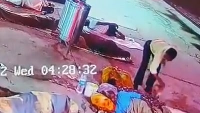 Screengrab from CCTV footage shared by Mathura Police showing the man kidnapping the baby. (Twitter)
