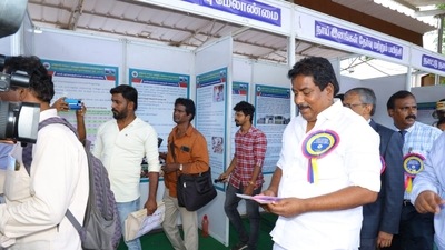 P Moorthy, Tamil Nadu minister for commercial taxes and registration, was the chief guest of the dog show. He walks through the expo covering each stall. (Source: Students from Veterinary College and Research Institute, Theni) P Moorthy, Tamil Nadu minister for commercial taxes and registration, was the chief guest of the dog show. He walks through the expo covering each stall. (Source: Students from Veterinary College and Research Institute, Theni)