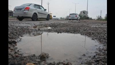 The road, which is also known as PR-7, is pothole riddled and has not been re-carpeted for four years. (Sant Arora/HT) The road, which is also known as PR-7, is pothole riddled and has not been re-carpeted for four years. (Sant Arora/HT)