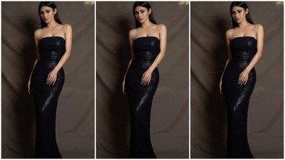 On Sunday, Mouni took to Instagram to drop pictures from a new photoshoot. It showed the Brahmastra actor embracing glamour and sass while serving stunning poses for the camera. She slipped into a black strapless gown from the shelves of designer Rudraksh Dwivedi's clothing label. Keep scrolling to check out Mounis' photos from the shoot. (Instagram/@imouniroy) On Sunday, Mouni took to Instagram to drop pictures from a new photoshoot. It showed the Brahmastra actor embracing glamour and sass while serving stunning poses for the camera. She slipped into a black strapless gown from the shelves of designer Rudraksh Dwivedi's clothing label. Keep scrolling to check out Mounis' photos from the shoot. (Instagram/@imouniroy)