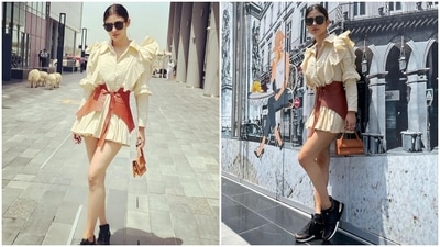 Earlier, Mouni had posted pictures of herself enjoying a day out in Dubai, United Arab Emirates. The star captioned her post, "It's so hot outside, just freeze me or burn me or whatever." It showed Mouni posing for the camera dressed in an off-white shirt dress teamed with a tan-coloured faux leather waist corset. (Instagram/@imouniroy) Earlier, Mouni had posted pictures of herself enjoying a day out in Dubai, United Arab Emirates. The star captioned her post, "It's so hot outside, just freeze me or burn me or whatever." It showed Mouni posing for the camera dressed in an off-white shirt dress teamed with a tan-coloured faux leather waist corset. (Instagram/@imouniroy)