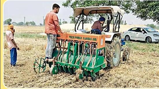 With applications outnumbering the machines available with the Punjab government, the allotment will be done through a lottery system by district-level committees, headed by deputy commissioners. (HT File) With applications outnumbering the machines available with the Punjab government, the allotment will be done through a lottery system by district-level committees, headed by deputy commissioners. (HT File)