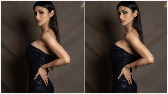 अंत में, मौनी ने लुक को क्लासी और उपद्रव-मुक्त रखने के लिए पहनावे के साथ सभी एक्सेसरीज़ को छोड़ दिया।  स्टार को अक्सर अपने आउटफिट्स के साथ ज्वेलरी स्किप करने और स्टाइल स्टेटमेंट को बैलेंस करने के लिए मैक्सिममिस्ट ड्रेसेस चुनने के लिए जाना जाता है। (Instagram/@imouniroy)