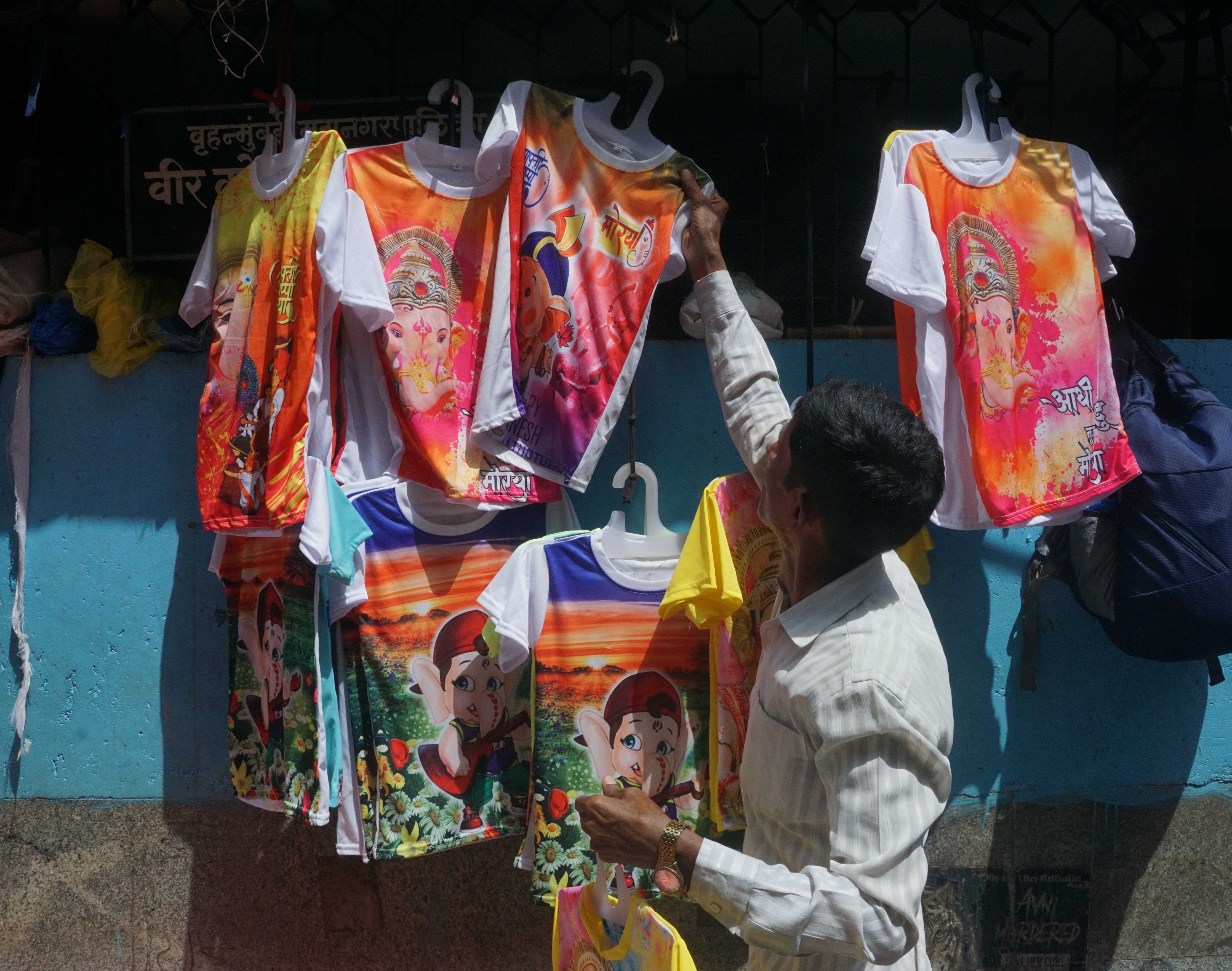The t-shirts with ganesha’s face costs rs 150 The t-shirts with ganesha’s face costs rs 150