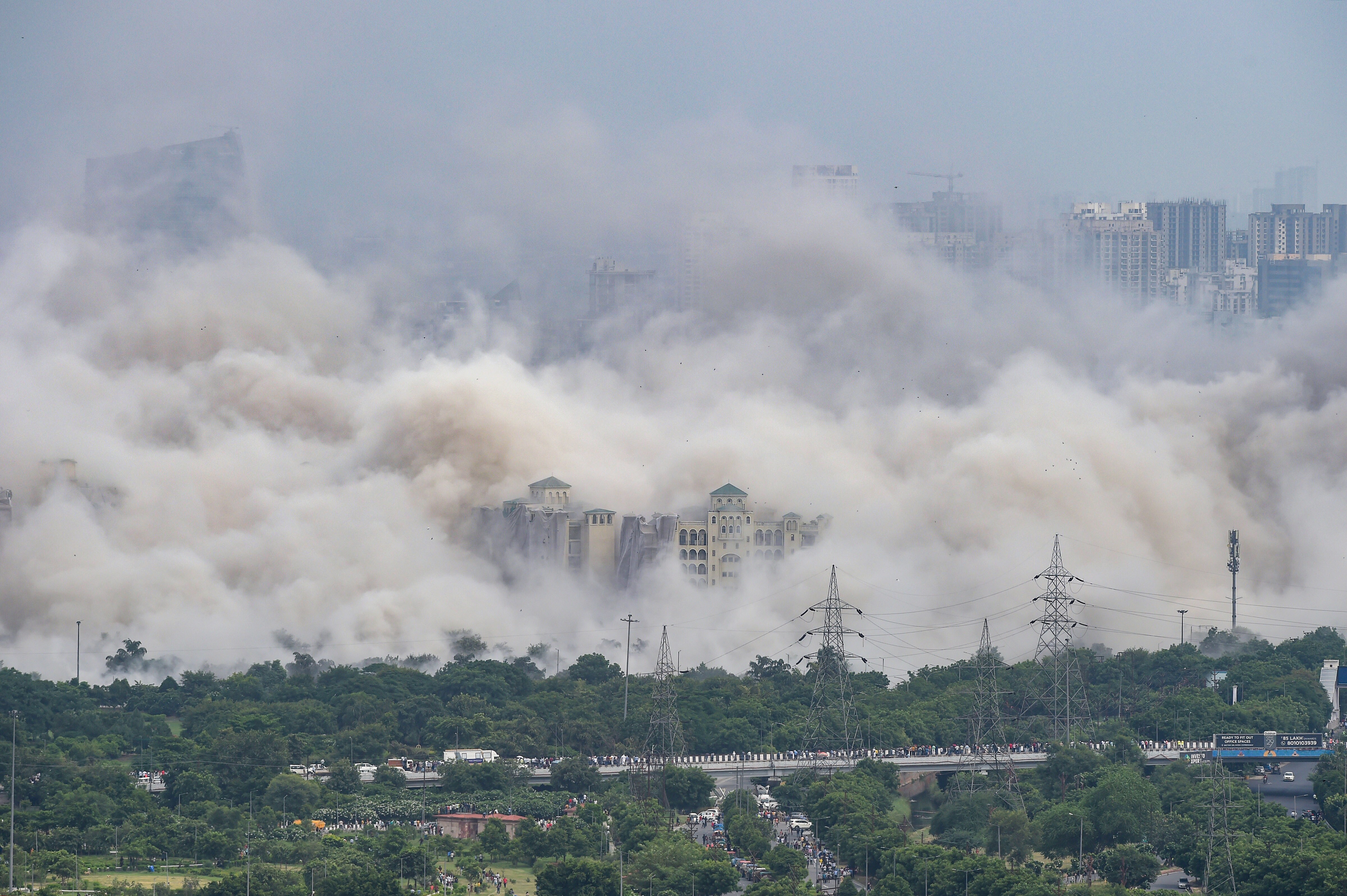 Dust covers the area after demolition of Supertech's twin towers in Noida on Sunday, August 28, 2022. (PTI Photo/Atul Yadav) Dust covers the area after demolition of Supertech's twin towers in Noida on Sunday, August 28, 2022. (PTI Photo/Atul Yadav)