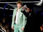 Jack Harlow and Lil Nas X accept the Best Collaboration award for Industry Baby at the 2022 MTV VMAs in Newark, New Jersey. (AFP)