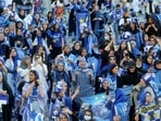 Iranian women fans of Esteghlal football club cheer during a match between Esteghlal and Mes Kerman at the Azadi stadium in the capital Tehran. Iranian women fans of Esteghlal football club cheer during a match between Esteghlal and Mes Kerman at the Azadi stadium in the capital Tehran.