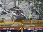 Workers near debris of the demolished twin towers of Supertech, in Noida on Monday, August 29, 2022. (PTI Photo/Atul Yadav) Workers near debris of the demolished twin towers of Supertech, in Noida on Monday, August 29, 2022. (PTI Photo/Atul Yadav)