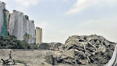 The debris of the Supertech twin towers settled down after the demolition in pursuance of a Supreme Court order that found the structures were built in violation of norms, in Noida on Monday (ANI) The debris of the Supertech twin towers settled down after the demolition in pursuance of a Supreme Court order that found the structures were built in violation of norms, in Noida on Monday (ANI)