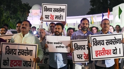 AAP MLAs holds a protest demanding the resignation of Delhi Delhi LG Vinay Kumar Saxena, at Vidhan sabha in New Delhi on Monday. (ANI) AAP MLAs holds a protest demanding the resignation of Delhi Delhi LG Vinay Kumar Saxena, at Vidhan sabha in New Delhi on Monday. (ANI)