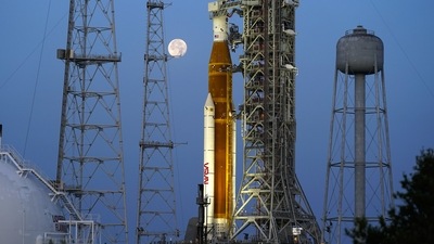 FILE - The moon sets in front of the NASA Artemis rocket with the Orion spacecraft aboard on pad 39B at the Kennedy Space Center, in Cape Canaveral, Florida. (AP) FILE - The moon sets in front of the NASA Artemis rocket with the Orion spacecraft aboard on pad 39B at the Kennedy Space Center, in Cape Canaveral, Florida. (AP)