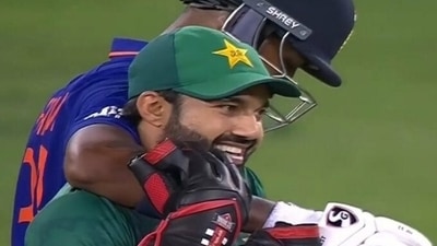 Hardik Pandya hugs Mohammad Rizwan from behind during IND vs PAK in Dubai (Twitter) Hardik Pandya hugs Mohammad Rizwan from behind during IND vs PAK in Dubai (Twitter)