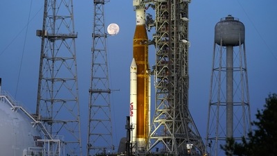 The moon sets in front of the NASA Artemis rocket with the Orion spacecraft aboard on pad 39B at the Kennedy Space Center. (AP) The moon sets in front of the NASA Artemis rocket with the Orion spacecraft aboard on pad 39B at the Kennedy Space Center. (AP)