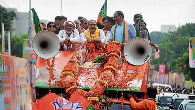 Newly appointed UP BJP chief Bhupendra Chaudhary taking part in a road show after his arrival in Lucknow on Monday. (Deepak Gupta/HT Photo) Newly appointed UP BJP chief Bhupendra Chaudhary taking part in a road show after his arrival in Lucknow on Monday. (Deepak Gupta/HT Photo)