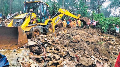 Rescue operations underway after a landslide was triggered by heavy rains at Kanjar village in Kerala’s Idukki district on Monday. (PTI)