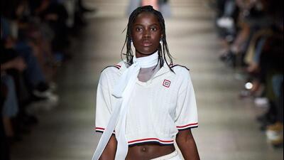 A model walks the ramp wearing tennis top and skirt at Miu Miu’s Fall 2022 ready-to-wear collection A model walks the ramp wearing tennis top and skirt at Miu Miu’s Fall 2022 ready-to-wear collection
