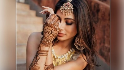 If you have a basic and simplistic vibe then Mouni Roy's mehndi design is ideal for you. The actress chose a simple mehndi pattern with her husband's initials. The intricate design is very attractive. It has just the proper amount of intricacy and isn't overly packed. (Instagram ) If you have a basic and simplistic vibe then Mouni Roy's mehndi design is ideal for you. The actress chose a simple mehndi pattern with her husband's initials. The intricate design is very attractive. It has just the proper amount of intricacy and isn't overly packed. (Instagram )