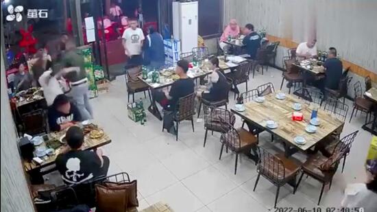 A man assaults a woman at a restaurant in the northeastern city of Tangshan, China, on June 10, 2022, in this screen grab taken from surveillance footage. (REUTERS/FILE)