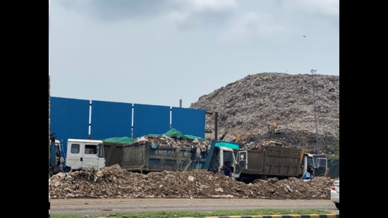 Truck loads of waste add to the growing mountain of waste Faridabad-Gurugram Expressway (Shailja Vaidya Gupta)
