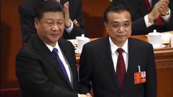 For President Xi Jinping (left), 2022 has turned out to be his hottest summer in years. (AP Photo)