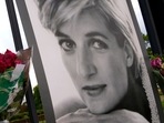 Flowers and a portrait of Princess Diana are displayed on the gates of Kensington Palace, in London, Tuesday, Aug. 30, 2022. This week marks the 25th anniversary of Princess Diana's death in a Paris car crash. (AP) Flowers and a portrait of Princess Diana are displayed on the gates of Kensington Palace, in London, Tuesday, Aug. 30, 2022. This week marks the 25th anniversary of Princess Diana's death in a Paris car crash. (AP)