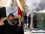 Gunmen cruised in pickup trucks carrying machine guns and brandishing grenade launchers. Overnight, sustained gun and rocket fire rang out across Baghdad.(AP & AFP) Gunmen cruised in pickup trucks carrying machine guns and brandishing grenade launchers. Overnight, sustained gun and rocket fire rang out across Baghdad.(AP & AFP)