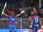Afghanistan's Najibullah Zadran, left, celebrate after hitting wining boundary during the T20 Asia Cup Afghanistan's Najibullah Zadran, left, celebrate after hitting wining boundary during the T20 Asia Cup